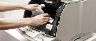 what to do if paper is stuck in the printer