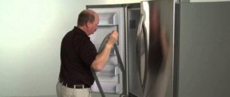 how to rehang a refrigerator door Indesit