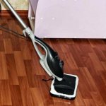 Is it possible to clean laminate flooring with a steam cleaner?