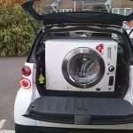 Is it possible to transport a washing machine while lying in the car?