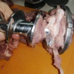 meat wound around the auger