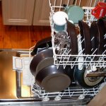 An example of placing pans in two dishwasher hopper trays for effective washing