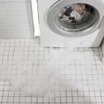 washing machine leaks from below during washing